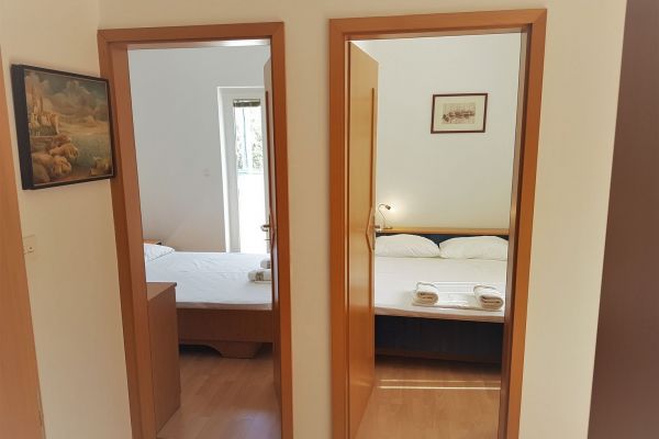 2-apartments-vrtlici-a1-view-on-2-bedroms-with-double-bedf530df4b-4a4a-232f-4b94-d33ec93eee6eB3A51A84-DFD8-04B7-7999-CEE1565AD070.jpg